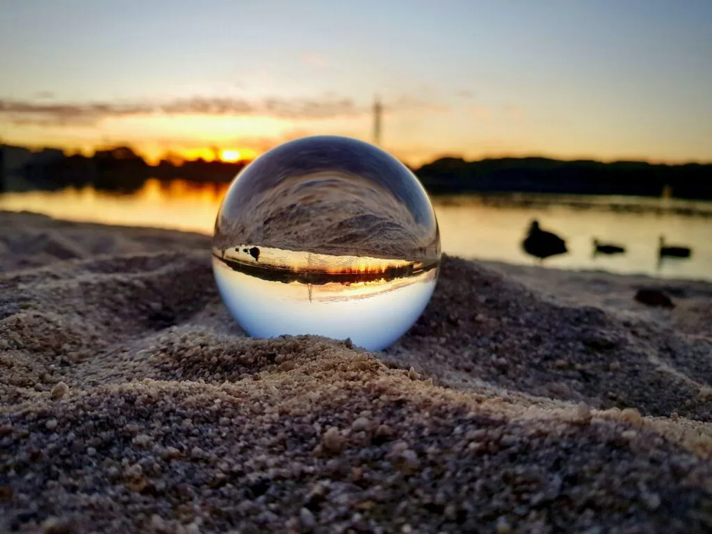 blog theme glass ball in sunset