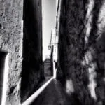 A ray of sunlight in Mdina Alley in black and White