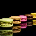 Colourful macaroons with black background