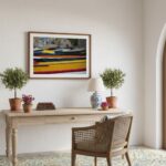 Wooden console table with plants and framed artwork