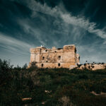 Historic Fort San Lucian under a dramatic sky in Marsaxlokk, Malta