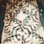 Handmade Maltese lace pattern pinned on a cushion