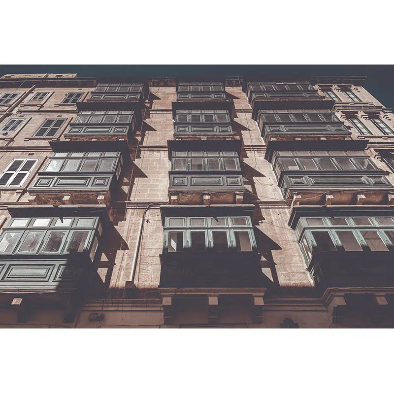 Traditional Maltese wooden balconies on a historic Valletta facade