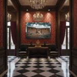 A beautifully designed modern living room featuring a large, vibrant print of Gozo Qbajjar Battery Gateway on the wall above a sleek sofa. Natural light streams in from a nearby window, highlighting the artwork and creating a warm, inviting atmosphere.