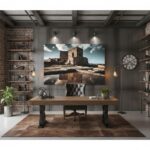 Gozo Qbajjar Battery Reflections wall art displayed in a modern living room with a grey sofa, wooden coffee table, and a large window offering natural light