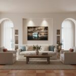 A "Gozo Dwejra Luzzu - Wall Art" print displayed in a modern living room above a sofa with natural light streaming in, showcasing its vibrant colors and detailed illustration of the traditional Maltese fishing boat in the Dwejra Bay.