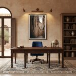 A warm, inviting living room featuring a large, framed print of the Malta Mdina Lantern Alley hanging prominently above a modern sofa. Soft, ambient lighting highlights the artwork and the cozy atmosphere of the room.