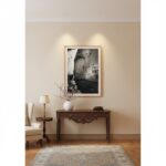 Mgarr Malta Townhouse Steps wall art displayed in a modern living room above a sofa with throw pillows and a coffee table with a plant and books, creating a cozy and inviting atmosphere.