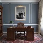 A framed print of Rabat Malta Vjal Santu Wistin - Malta Wall Art displayed in a modern living room with a neutral color palette, natural light, and a few decorative plants.