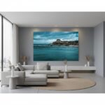 Gozo Qbajjar Qolla l-bajda is shown during blue hour with a person in the foreground observing the bay, conveying a peaceful lifestyle.