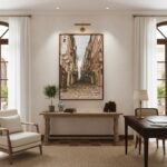 A large, vibrant wall art print featuring the Valletta Malta Grand Harbour Hotel Steps hangs above a modern, light grey sofa in a stylish living room. A potted plant sits on a side table next to the sofa, and natural light streams in from a window, creating a serene and inviting atmosphere.