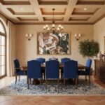 A chic, minimalist living room featuring a large framed print of an ornate Maltese stone balcony above a neutral-toned sofa, with natural light streaming in from a window, highlighting the artwork as a focal point.