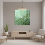 A living room with a sofa, a coffee table, and a framed print of "Mint Texture Abstract" on the wall