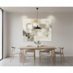 Minimalist dining room with abstract wall art