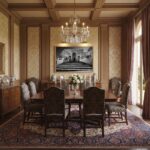 Elegant traditional dining room with chandelier and rug