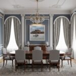 Elegant classical dining room with chandelier and blue walls