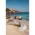 Rocky coastline with turquoise water and sandy beach