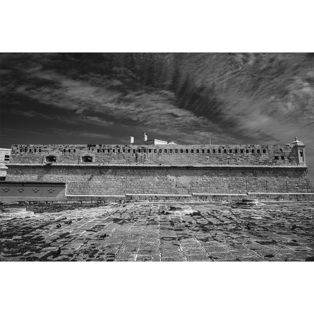 Black and white historic stone fortress wall