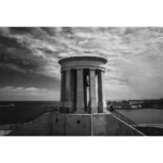 Circular stone monument overlooking the sea