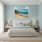 Modern bedroom with beach artwork above bed