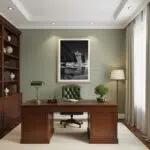 Elegant home office with wooden desk and bookshelf