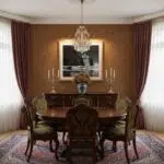 Elegant traditional dining room with chandelier and wooden table