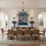 Elegant Mediterranean dining room with chandelier and artwork