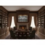 Elegant wood-paneled library with fireplace and bookshelves