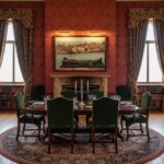 Elegant dining room with round table and fireplace