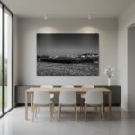 Minimalist dining room with large black-and-white wall art