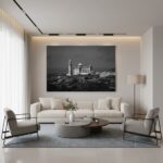 Modern minimalist living room with large black-and-white artwork