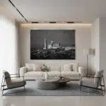 Modern minimalist living room with large black-and-white artwork