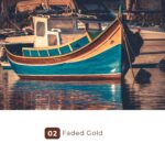 Colorful fishing boat moored in golden marina light
