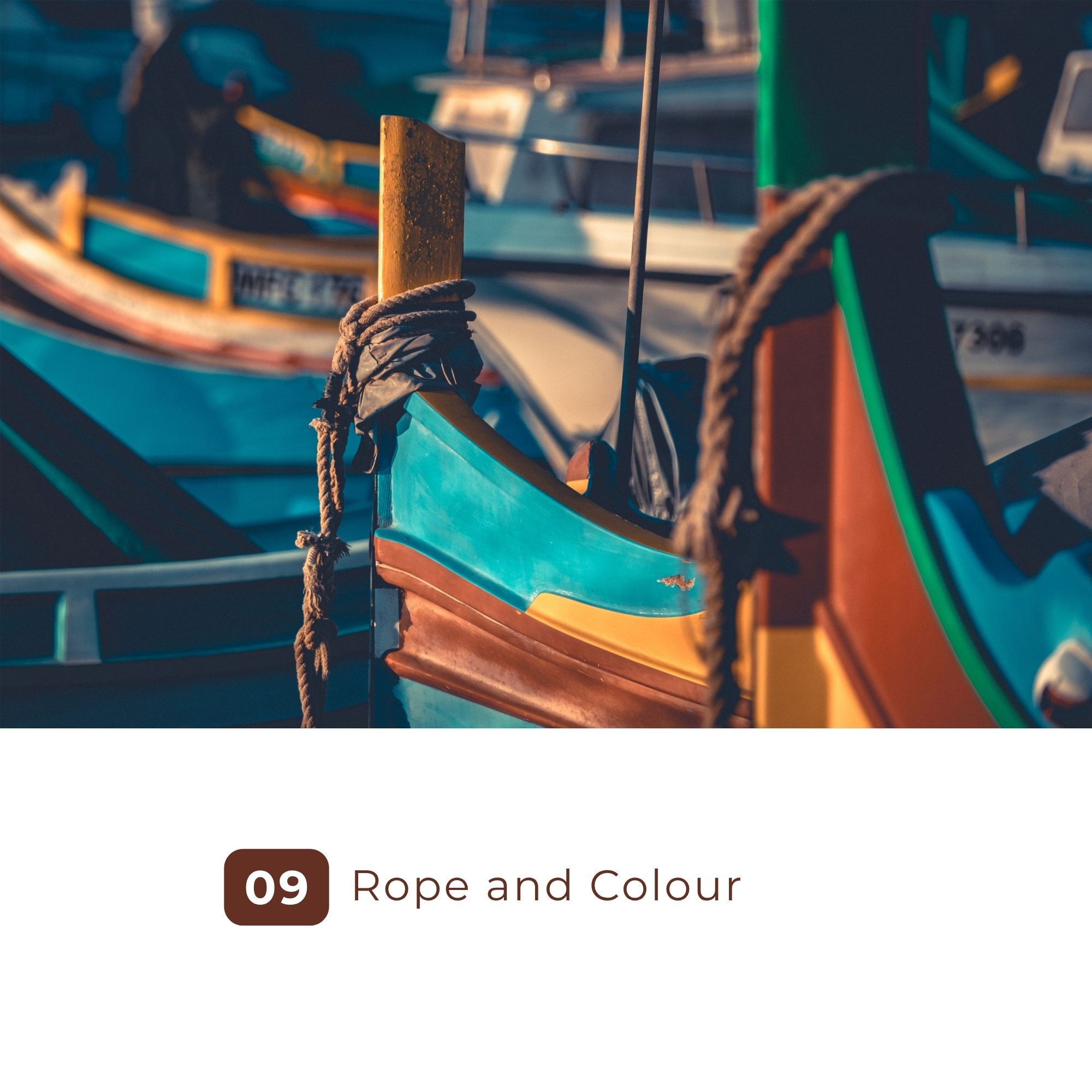 Rope tied around colorful wooden boats