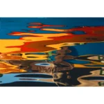 Abstract reflections of orange, blue, and yellow on water
