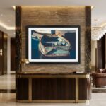 Framed boat artwork above elegant hotel reception desk