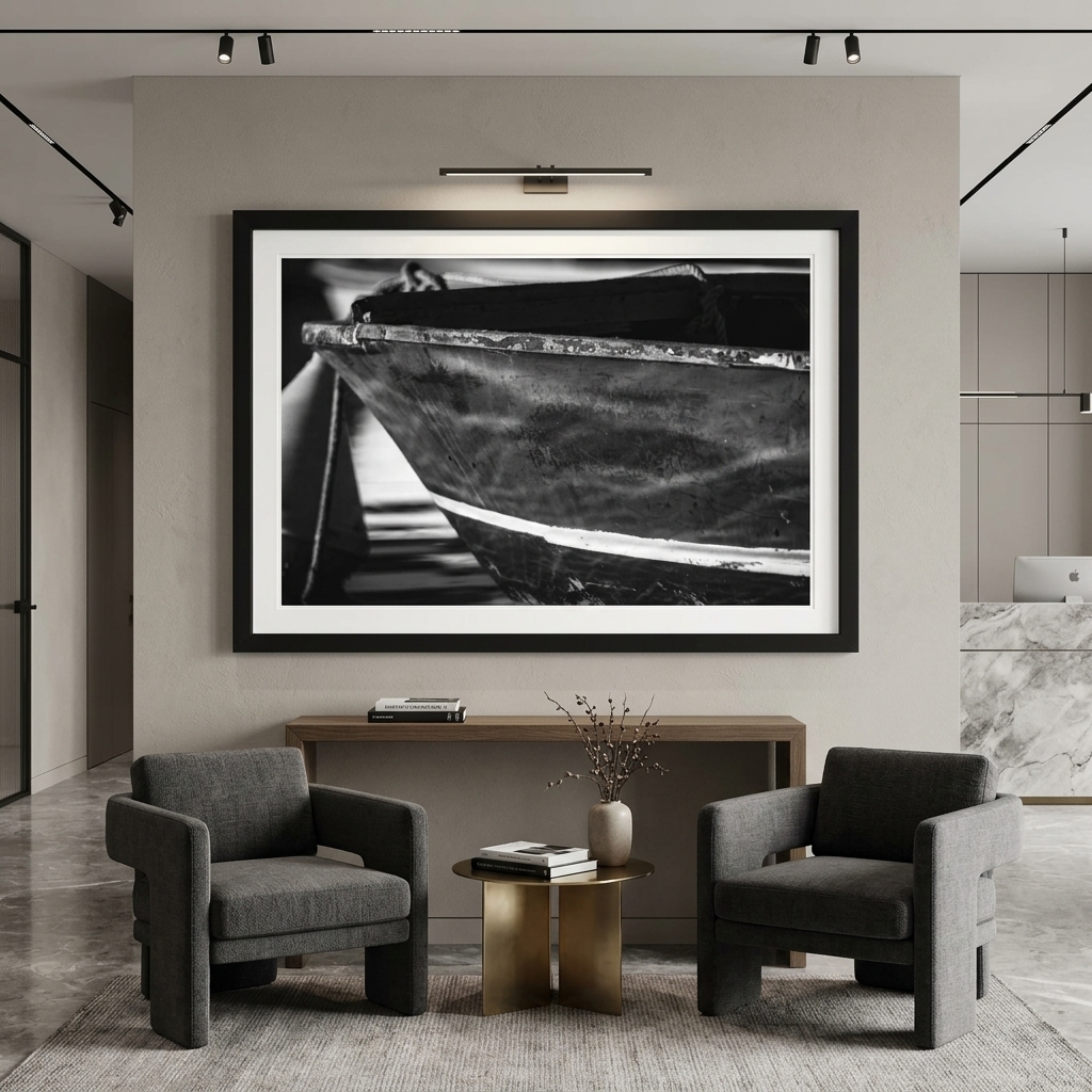 Modern lounge with black-and-white boat photograph