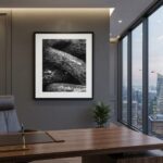 Modern executive office with city skyline and framed rock photograph