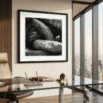 Framed black-and-white stone photograph in modern office