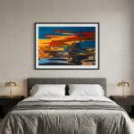 Modern bedroom with colorful abstract artwork above bed