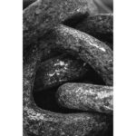 Black-and-white macro of textured folded fabric layers