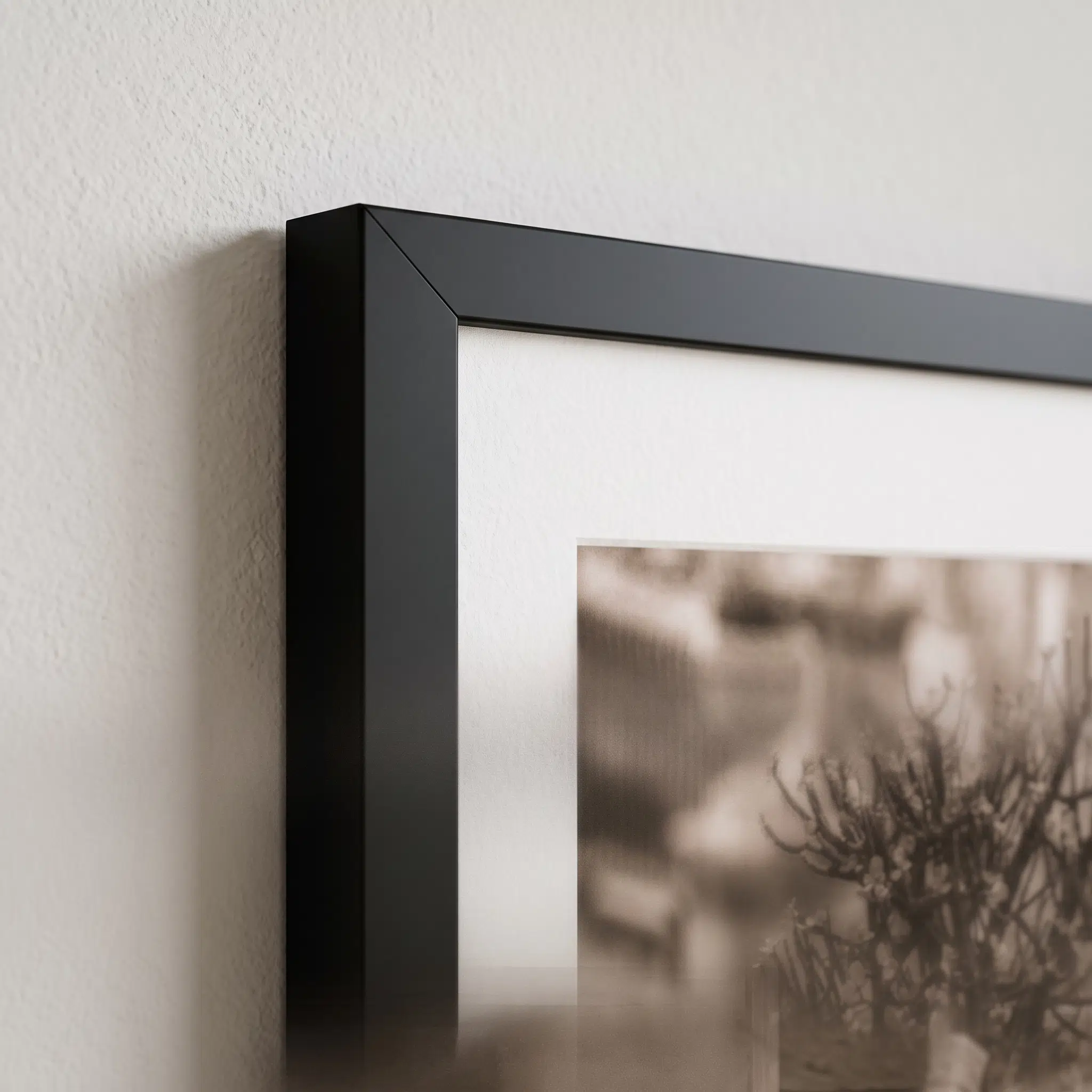 Close-up of matte black picture frame corner
