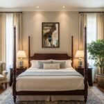 Elegant four-poster bed in warmly lit traditional bedroom