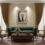Elegant living room with green sofa and classic decor